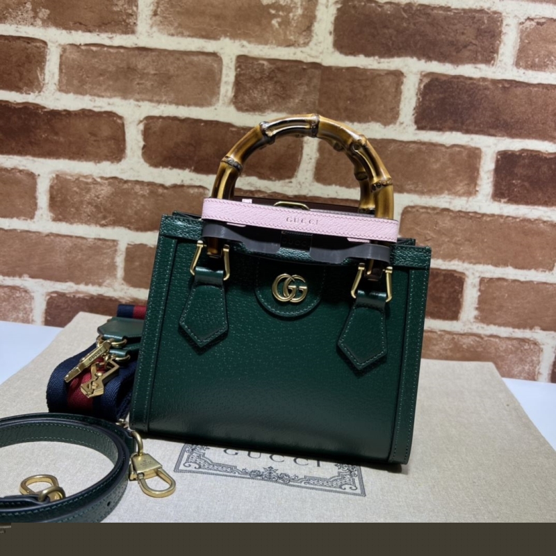G*u*i top handle bags